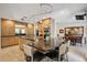 Open kitchen featuring stainless appliances, granite countertops, a breakfast bar and an island at 711 Birdsong Ln, Sarasota, FL 34242