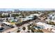 Aerial view showcasing a retail district with vibrant buildings and active street life at 711 Birdsong Ln, Sarasota, FL 34242