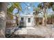 The exterior features a storage shed with a neutral color scheme at 711 Birdsong Ln, Sarasota, FL 34242