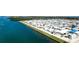 Aerial view of waterfront homes showcasing the community's proximity to the water at 10315 Cortez W Rd # 8Bv, Bradenton, FL 34210