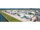 Aerial view of a single-story home featuring a charming exterior and tidy landscaping at 10315 Cortez W Rd # 8Bv, Bradenton, FL 34210