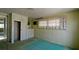 The bedroom is well-lit with storage and includes closet space and a bright, open layout for comfort at 10315 Cortez W Rd # 8Bv, Bradenton, FL 34210