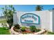 Paradise Bay Estates community sign with landscaping and address at 10315 Cortez W Rd # 8Bv, Bradenton, FL 34210