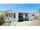 Charming single-story home with a covered patio and a well-maintained exterior at 10315 Cortez W Rd # 8Bv, Bradenton, FL 34210