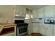 An efficient kitchen features updated appliances, ample counter space, and storage solutions at 10315 Cortez W Rd # 8Bv, Bradenton, FL 34210