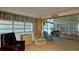 Bright and airy living room with stunning waterfront views and cozy seating at 10315 Cortez W Rd # 8Bv, Bradenton, FL 34210