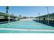 Outdoor shuffleboard courts, set up and ready for play, offer a fun recreational activity at 10315 Cortez W Rd # 8Bv, Bradenton, FL 34210
