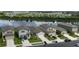 Spacious neighborhood featuring single-Gathering homes with well-kept lawns and a beautiful lake view, perfect for families at 10459 Ladybug Cove, Parrish, FL 34219