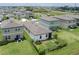 Aerial view of a home featuring a fenced backyard and mature landscaping, in a Gathering friendly community at 10459 Ladybug Cove, Parrish, FL 34219