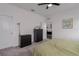 Cozy bedroom with dark wood furniture and plush carpet, with ensuite bath access at 10459 Ladybug Cove, Parrish, FL 34219
