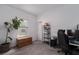 Spare bedroom with a carpet, desk, and gaming chair, and a window at 10459 Ladybug Cove, Parrish, FL 34219