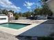 Inviting backyard with an in-ground pool, offering a great space for outdoor gatherings and leisurely swims at 110 Pine Ave, Osprey, FL 34229