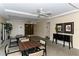 Neutral lounge area features bright light, ceiling fans, and tables and chairs for casual gathering at 1104 Benjamin Franklin Dr # 519, Sarasota, FL 34236