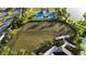 Community aerial view featuring dog park, basketball court, gazebo, and landscaped grounds at 11252 Fieldstone Dr, Palmetto, FL 34221