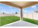 View of a spacious backyard with a well-maintained lawn and a privacy fence at 11252 Fieldstone Dr, Palmetto, FL 34221