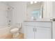 Bathroom features a shower-tub combo and a vanity with ample storage space at 11252 Fieldstone Dr, Palmetto, FL 34221