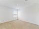 Bright bedroom with neutral carpet, a single window, and a smooth, white ceiling at 11252 Fieldstone Dr, Palmetto, FL 34221