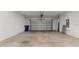 Spacious two car garage featuring a garage door opener, perfect for parking and storage at 11252 Fieldstone Dr, Palmetto, FL 34221