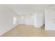 Inviting living room with tile floors, natural light, and a staircase leading to the upper level at 11252 Fieldstone Dr, Palmetto, FL 34221