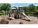 Community playground for to enjoy, complete with slides and climbing structures at 11252 Fieldstone Dr, Palmetto, FL 34221