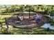 Community playground for to enjoy, complete with slides and climbing structures at 11252 Fieldstone Dr, Palmetto, FL 34221