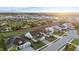 An aerial view of homes and a pond in a well-maintained residential neighborhood at 11420 Golden Bay Pl, Bradenton, FL 34211
