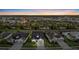 Aerial view of a meticulously landscaped residential neighborhood with beautiful homes and green spaces at 11420 Golden Bay Pl, Bradenton, FL 34211