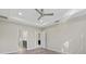 Bright bedroom offers recessed lights, ceiling fan, and ensuite bath and closet, enhancing comfort and privacy at 11420 Golden Bay Pl, Bradenton, FL 34211