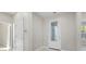 Entryway featuring white doors and neutral paint, creates a bright and welcoming entrance at 11420 Golden Bay Pl, Bradenton, FL 34211