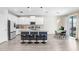 Bright kitchen featuring stainless steel appliances, island with bar seating, and a breakfast nook at 11421 Carlton Fields Dr, Riverview, FL 33579