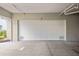 Spacious garage with a white paneled door, marked with the number 12, offering secure parking at 1240 Dolphin Bay Way # 304, Siesta Key, FL 34242