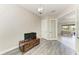 Home office area with wood-look floors, view of backyard and pool at 13107 Bridgeport Xing, Lakewood Ranch, FL 34211