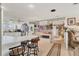 Bright kitchen and bar area with updated stainless appliances and plenty of storage at 1320 Magellan Dr, Sarasota, FL 34243