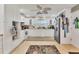 Clean kitchen featuring white cabinets and stainless steel appliances at 1320 Magellan Dr, Sarasota, FL 34243