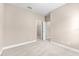 Clean bedroom with neutral carpet, walk-in closet, and neutral-painted walls at 13487 Old Creek Ct, Parrish, FL 34219