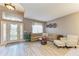 Inviting living room with large windows, tile floors, and comfortable seating at 135 River Enclave Ct, Bradenton, FL 34212
