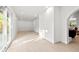 Bright bonus room with recessed lighting, light wood floors, and sliding glass doors to the backyard at 1406 N Riverhills Dr, Temple Terrace, FL 33617