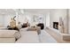 Cozy living room featuring a modern fireplace, comfortable seating, and stylish decor at 1406 N Riverhills Dr, Temple Terrace, FL 33617
