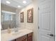 Bathroom with a single vanity sink, and a walk-in shower at 14404 18Th E Pl, Bradenton, FL 34212