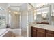 Shower and vanity area, including a glass enclosed shower at 14404 18Th E Pl, Bradenton, FL 34212