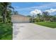 Beautiful home featuring a spacious driveway and a three-car garage, perfect for car enthusiasts at 14404 18Th E Pl, Bradenton, FL 34212