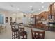 Stylish kitchen boasts granite countertops, modern appliances, and bar seating for casual dining at 14404 18Th E Pl, Bradenton, FL 34212