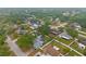 A community aerial view featuring fenced yards, lush landscaping and beautiful homes at 1727 Lake Crest Ave, Brandon, FL 33510