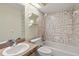 Bathroom with a tub and shower combo and a vanity with sink at 1727 Lake Crest Ave, Brandon, FL 33510