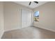 Bedroom showcasing neutral colors, tile flooring, and a double door closet at 193 Rotonda N Blvd, Rotonda West, FL 33947
