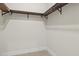 Walk-in closet with custom shelving and ample storage space at 193 Rotonda N Blvd, Rotonda West, FL 33947