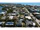 Aerial view of home near ocean and beaches with nearby shopping and entertainment at 203 Peacock Ln # B, Holmes Beach, FL 34217