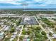 Aerial view of the property, conveniently located near Siesta Key, lush greenery, and the surrounding neighborhood at 2225 Alice Rd, Sarasota, FL 34231