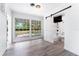 Office with bathroom featuring shower and wood-look floors at 2225 Alice Rd, Sarasota, FL 34231