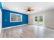 Bright bedroom with French doors leading to the yard at 2225 Alice Rd, Sarasota, FL 34231